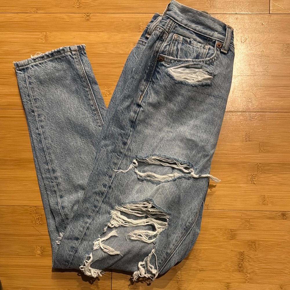 Distressed Blue Jeans
